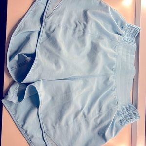 Lululemon shorts high-rise 4 inch Hotty hots. Size 4. Cool blue. Like new.